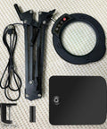 Magnifying Glass Desk Lamp With Clamp And Base, Real Glass Lens, 84 LEDs, showing components on a light fabric background.