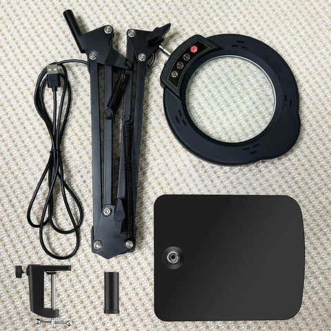 Magnifying Glass Desk Lamp With Clamp And Base, Real Glass Lens, 84 LEDs, showing components on a light fabric background.