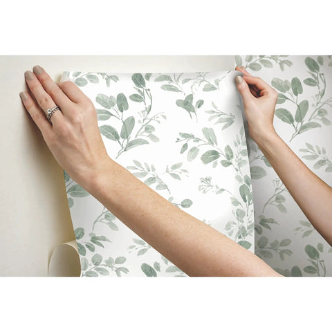 Applying Dancing Leaves Peel And Stick Wallpaper Green And White For A Quick Easy Wall Makeover No Glue Needed Removable Roll