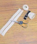 5-Inch Non-Stick Titanium Scissors With Glide Adjust Technology For Office And Home Craft, on wooden table with craft materials