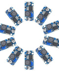 Adjustable DC to DC Buck Converter Module Pack of 10 arranged in circle, showing components and design.