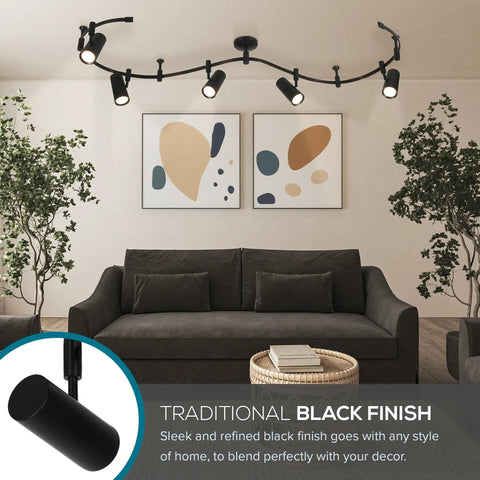 Living room with Ellipse Track Ceiling Light With Five Adjustable LED Heads In Black Finish, accenting modern decor and art.