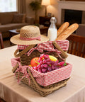 Dual Size Picnic Basket Set With Double Folding Handles 16 Inch Woodchip Woven Basket With Removable Red And White Liner on table.