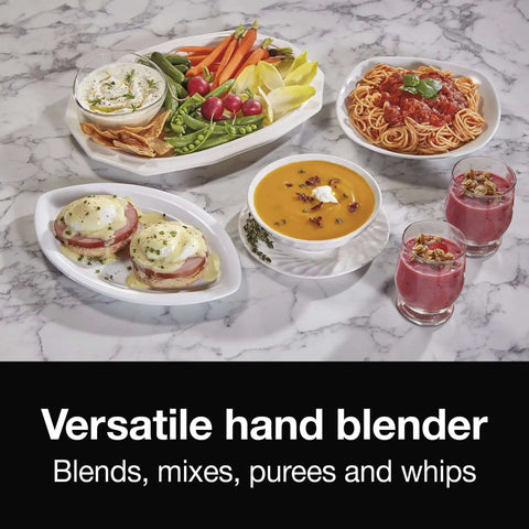 Smooth Operator Electric Immersion Blender With Detachable Dishwasher Safe Blades, Two Speed Settings For Hassle Free Purees, Whipped Cream And Quick Blending Of Soups, Smoothies, Sauces Directly Into Any Pot with various dishes on marble countertop.