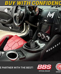 Real Carbon Fiber Shift Knob Upgrade With 4 Metal Adapters in car interior, featuring red seat and dashboard details.