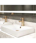 Low-Flow Brushed Bronze Single Hole Bathroom Faucet With Drain Assembly installation on white marble countertop