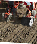 Beefed-Up Planting Wheel Rubber Soil Pressing Roller, Precision Seeder Accessory in use on row crop planter in field