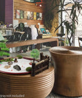 Desktop Zen Garden Kit For Your Desk Or Office, DIY Zen Garden Set With sand, rocks, rake, trees on round wooden table in store.