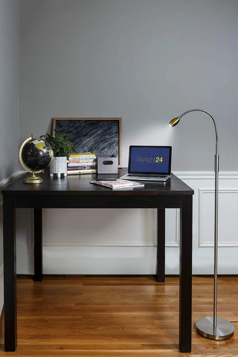 Room corner with desk, globe, and adjustable beam LED floor lamp with pull shade, 15.5-inch gooseneck, aluminum gold finish.