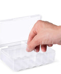 Hand interacting with Four Battery Storage Boxes For AA And AAA Clear Snap Lid Organizer Set Each Holds Up To 12 Batteries Everyday Carry Portable Case.