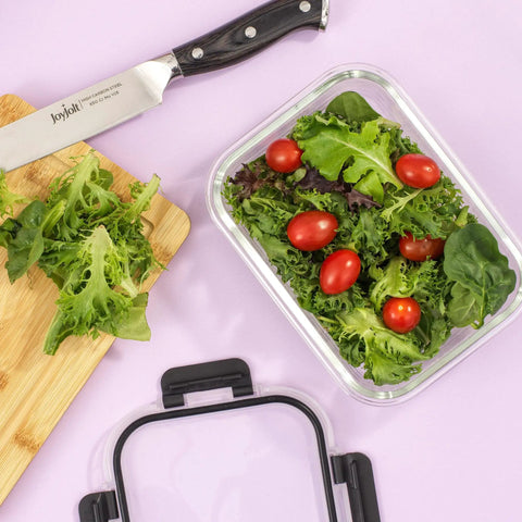 24Pc Borosilicate Glass Storage Containers With Lids For Meal Prep And Lunch, filled with salad beside cutting board and knife