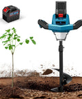 Beast 1200W Cordless Earth Auger With Reverse Function next to a small plant and battery, 6 inch bit for digging