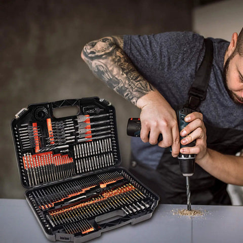 Man drilling into wood with Beast 246-Piece Titanium HSS Drill Bit Set With Carry Case For Metal Wood Masonry And Plastic Drilling