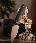 Koala Plus-BM Folding Knife with 2.99 inch blade, black micarta handle, 14C28N stainless steel in rugged setting