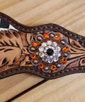 Custom Western Leather Headstall And Breast Collar Tack Set showcasing ornate leaf carving and colorful embellishments.