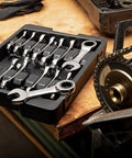 14 Piece 12 Point Stubby Ratcheting Wrench Set With SAE And Metric Sizes in tray on workbench in garage