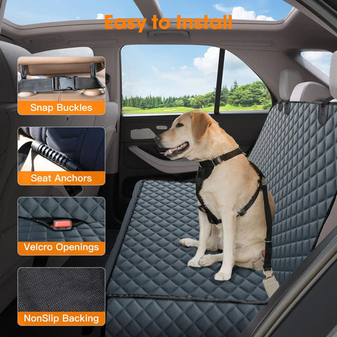 Waterproof Dog Car Seat Cover Back Seat Protector for Cars Trucks and SUVs With Nonslip Surface Includes One Dog Seat Belt Grey 53W x 47L Fits Most Vehicles shown in a car with a dog.