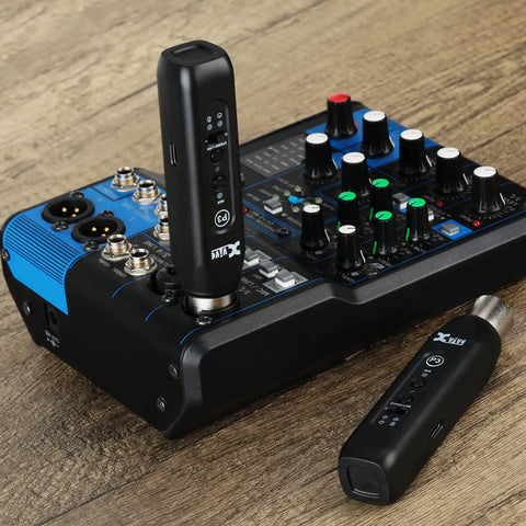 Bluetooth XLR Receiver For Audio Mixers PA Systems And DJ Setups With Professional Wireless Connectivity And High Fidelity Audio shown positioned with audio mixer.