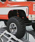 Close-up of RC car suspension with installed 45mm Aluminum Threaded Oil Shock Absorbers For One Twenty Fourth FCX24 And FMS