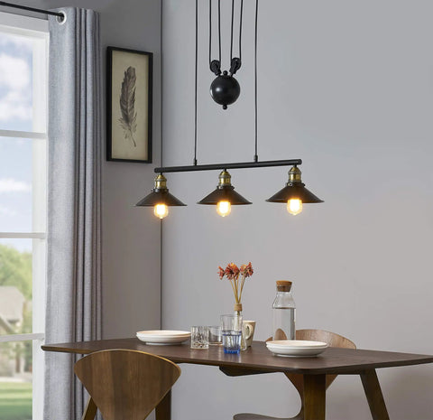 Three Light Pulley Pendant Light For Kitchen Island And Dining Room, lit over dining table, black rustic vintage industrial style