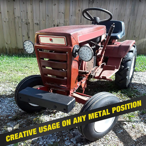 Beefy Universal Magnetic Base Light Bar Mounts With Rubber Boot installed on front of red tractor