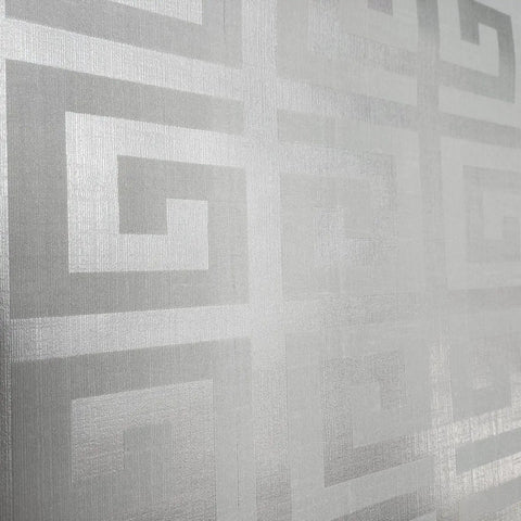 Modern Geometric Greek Key Wallpaper With Metallic Matte Finish detail showing matte silver design on textured surface.