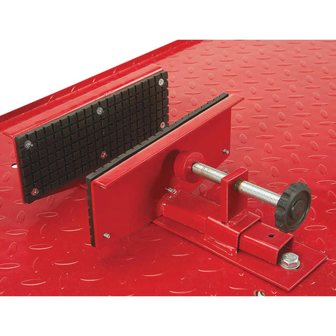 Close-up of red Steel Hydraulic Motorcycle Lift with 1100 Pound Capacity, Foot Operated Pump, Diamond Plate Platform.