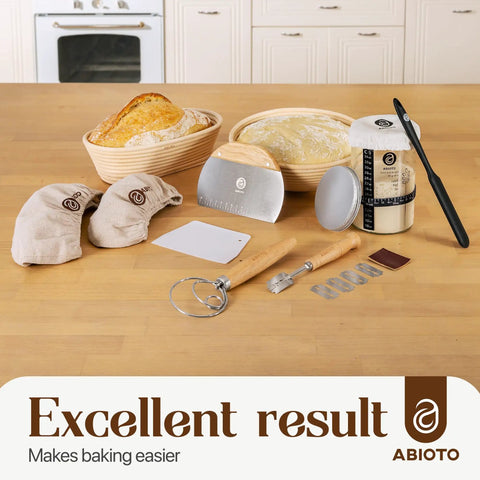 Go To Sourdough Starter Kit with 10 inch round and 11 inch oval banneton proofing baskets and 34oz starter jar on a kitchen counter