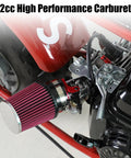 Close-up of 212cc high-performance carburetor and red air filter installed on mini bike engine.