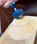 Badass Two Inch Tungsten Carbide Contour Wheel For Die Grinders, Coarse Grit Wood Carving And Heavy Material Removal, Includes No Hassle Fitting Adapter in action on wood surface.