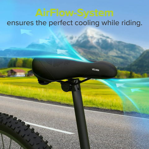 Memory Foam Bike Saddle With Air Ventilation for Men and Women on road bike, airflow visualization.