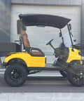 Yellow Electric Golf Cart Two Seater With Cargo Bed Rock Solid Frame Non Slip Tires Independent Suspension Full Led Lighting side view