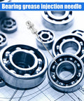 Bearing grease injection needle with ball bearings and blueprint in background for Grease Gun Accessory Kit With Hose 90 Degree Coupler Set Including Needle Dispenser Two Needle Nozzles Nozzle Cleaner Double Handle Coupler And Fittings For Must Have Gear Greasing Quick Attachments And Easy Refill.
