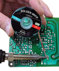 Desoldering Wick Copper Braided Solder Braid With Flux Ten Feet Long Two Point Five Millimeter Wide No Clean Rosin Flux Pro Grade Desoldering Wire For Circuit Boards And Electronics Repair being used on a circuit board.