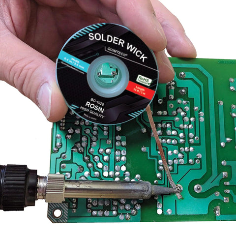 Desoldering Wick Copper Braided Solder Braid With Flux Ten Feet Long Two Point Five Millimeter Wide No Clean Rosin Flux Pro Grade Desoldering Wire For Circuit Boards And Electronics Repair being used on a circuit board.