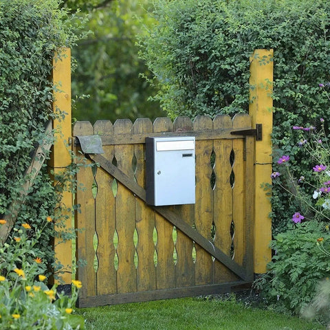 Wooden garden gate with mailbox, featuring hinges similar to Two Pack Zinc Alloy Hinges For Cabinets And Jewelry Boxes, Retro Iron Hardware.