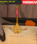 Spade Drill Bit Set 6 Piece Paddle Bits Three Eighths To One Inch With One Quarter Hex Shank For Woodworking shown drilling wood