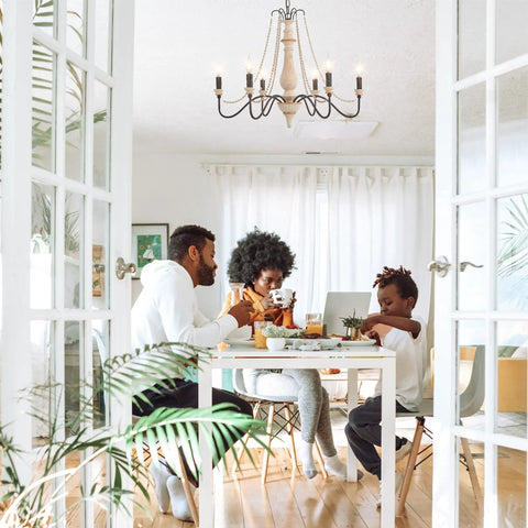 Six Light French Country Farmhouse Chandelier With Old School Vintage Candle Style And Glass Bead String Accents in dining room.