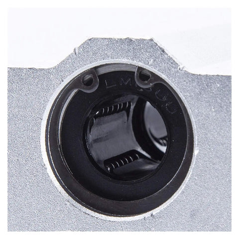 2 Pcs SCS10UU Linear Motion Bearing Slides 10mm Length for CNC Parts, 3D Printer Parts, and Precision Machine Tools, Smooth Low Friction Guide Rails for Accurate Positioning and Reliable Performance close-up of black linear bearing housing in silver block