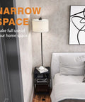 Space Saving Floor Lamp With Built In End Table And Storage Shelves beside a bed in a modern bedroom corner
