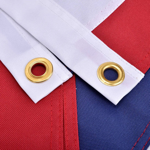Close-up of Heavy Duty 3x5 Outdoor American Flag Built To Last In High Wind With UV Protection Sewn Stripes, brass grommets visible