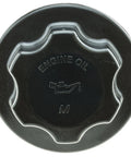 Top view of Oil Filler Cap MO148 for Dodge Ram 1500 2500 3500 and Durango 2003-2008, black with engravings for engine oil.