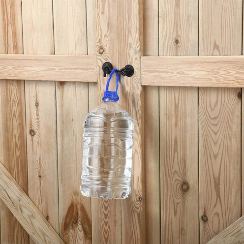 Heavy Duty 16 Pack Barn Door Hook And Eye Latch Kit Tough As Nails Stainless Steel Gate Hasp holding water bottle on wooden door.
