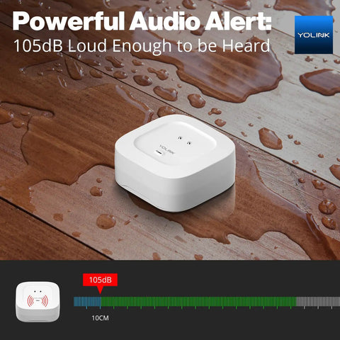 Smart Water Leak Detector 4 With 105dB Alarm, shown on wet wooden surface, highlighting powerful audio alert feature.