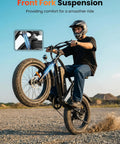 Powerful 1000W Fat Tire Electric Bike For Adults And Teens, 20 MPH Top Speed, 20x4 Fat Tires, Removable 10.4Ah Battery, USB Charging Port, 7-Speed Mountain And Commuter Ebike, Four Bikes In One For City, Trail, Snow And More. Rider on fat tire electric bike with front fork suspension