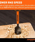 Jorgensen orange spade drill bit drilling into wood with wood shavings