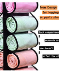 24 Compartments Legging And Shirt Storage Hanger with rolled leggings in black trim transparent pockets in a vertical view.