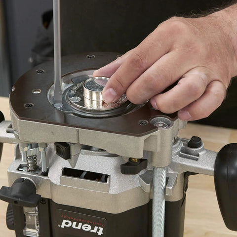Dead On Accuracy 30mm Router Guide Bush Spigot for Jig And Template Routing Designs shown mounted on a router.