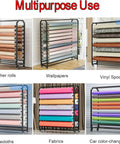 Heavy Duty Steel Fabric Storage Rack and Vinyl Roll Holder Cart with multiple rolls of leather, wallpaper, and vinyl spools.