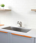Slick Pullout Kitchen Faucet With Brushed Nickel Stainless Steel Single Handle Compact Design And Dual Spray Modes Comes With Deck Plate For Super Easy Install And Quick Everyday Cleanup in a modern kitchen setting.